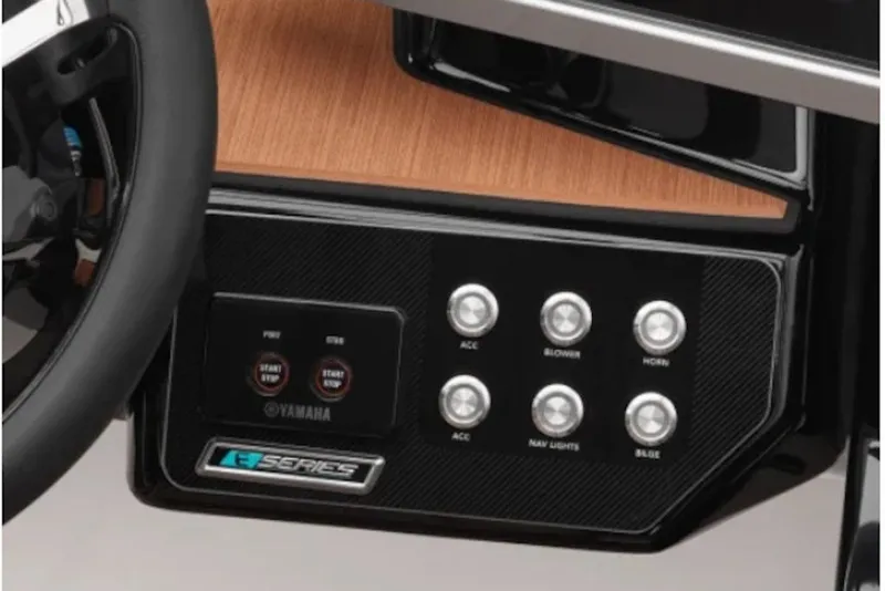 Slide: The Image of Dashboard of 2027 Yamaha Boats 222SD with control buttons and steering wheel. - 8