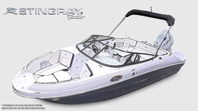 Slide: The Image of Stingray 22DC 2027: Sleek design with spacious deck, comfortable seating, and protective bimini top. - 14