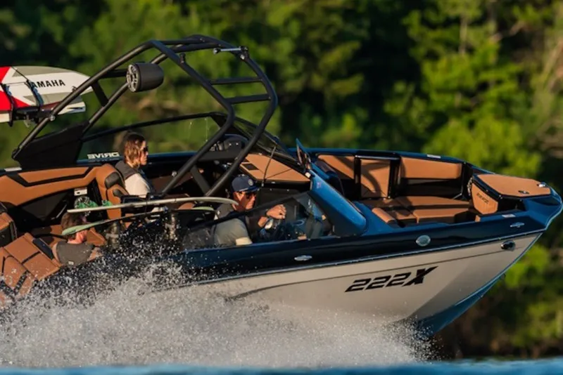 Slide: The Image of 2027 Yamaha Boats 222XD speeding on water, featuring sleek design and modern features. - 5