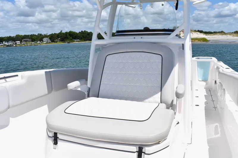 Slide: The Image of 2020 Sea Fox 288 Commander boat seat with ocean view and clear sky. - 15