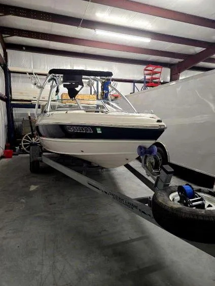 Slide: The Image of 2008 Stingray 205 LS/LX/LR boat on trailer in storage facility. - 2