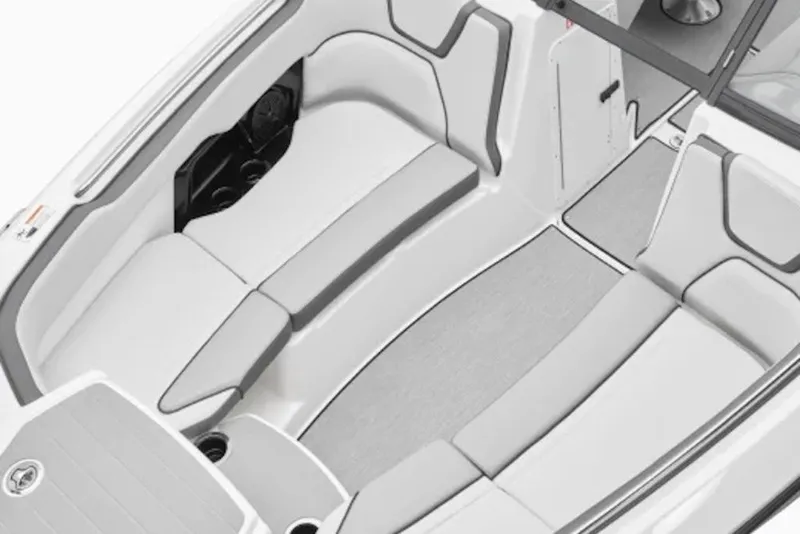 Slide: The Image of 2027 Yamaha Boats AR250 interior with sleek, modern seating and spacious layout. - 7