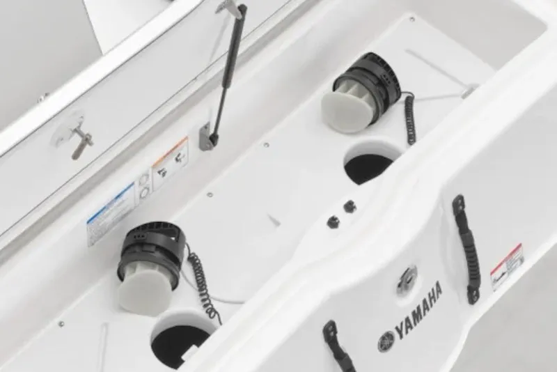 Slide: The Image of 2027 Yamaha Boats AR250 engine compartment with dual engines and safety features. - 12