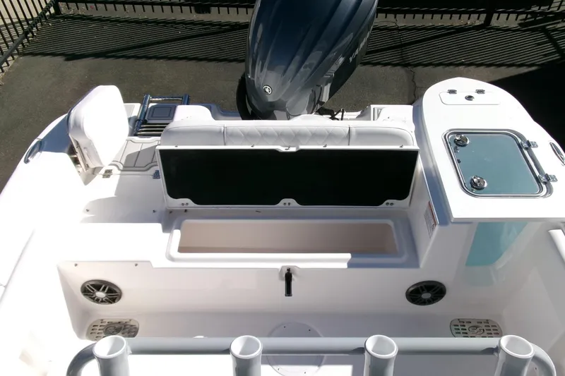 Slide: The Image of 2026 Sea Fox 248 Commander boat interior with seating and storage compartments. - 30