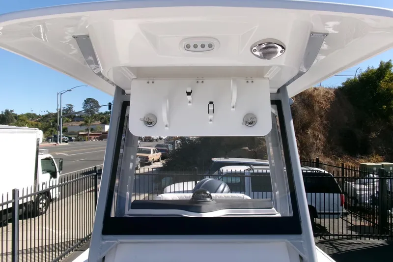 Slide: The Image of 2026 Sea Fox 248 Commander boat console with overhead storage and street view. - 13