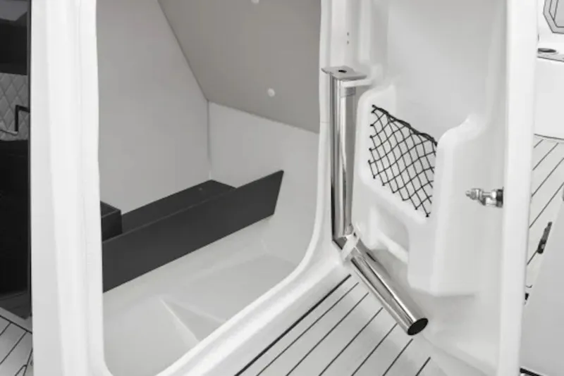 Slide: The Image of Interior view of 2026 Yamaha Boats 252S, featuring sleek storage and modern design elements. - 4