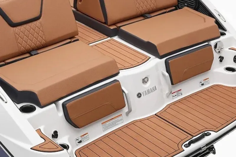 Slide: The Image of 2026 Yamaha Boats 252SD interior with tan seating and sleek design. - 6