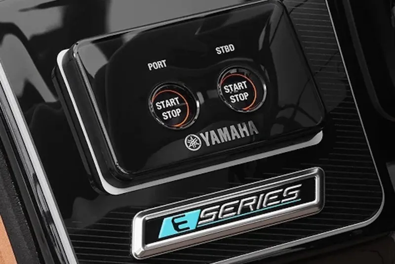 Slide: The Image of Dashboard of 2026 Yamaha Boats 252SD, featuring dual start-stop buttons and E-Series branding. - 11