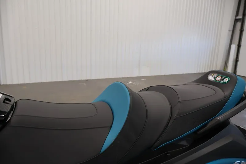 Slide: The Image of 2027 Yamaha WaveRunner VX Limited seat with blue accents in a garage setting. - 15