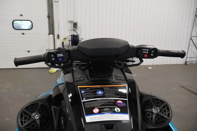 Slide: The Image of 2027 Yamaha WaveRunner VX Limited handlebars and controls in a garage setting. - 10