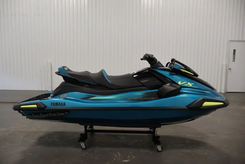 Slide: The Image of 2027 Yamaha WaveRunner VX Limited in a showroom, sleek blue design. - 3