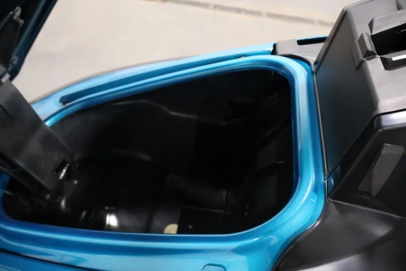 Slide: The Image of Open storage compartment of 2027 Yamaha WaveRunner VX Limited in blue. - 8