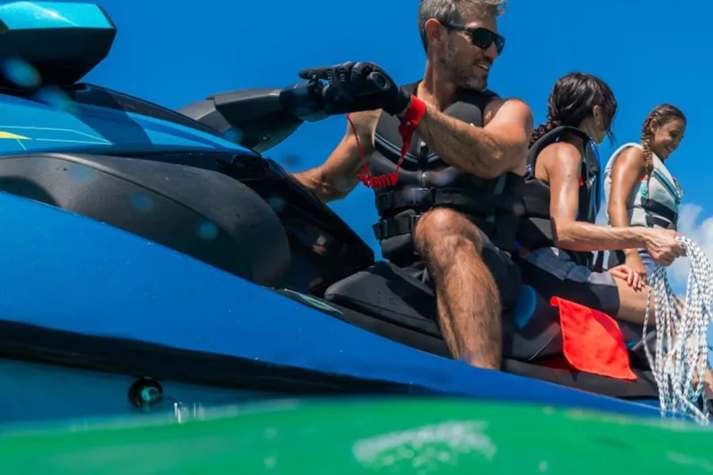 Slide: The Image of People enjoying a ride on a 2027 Yamaha WaveRunner VX Limited under a clear blue sky. - 3