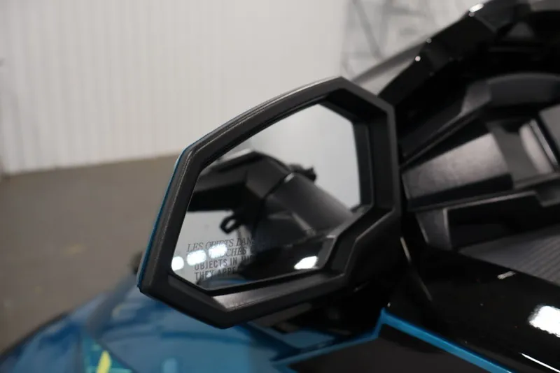 Slide: The Image of Close-up of 2027 Yamaha WaveRunner VX Limited side mirror in a showroom. - 16