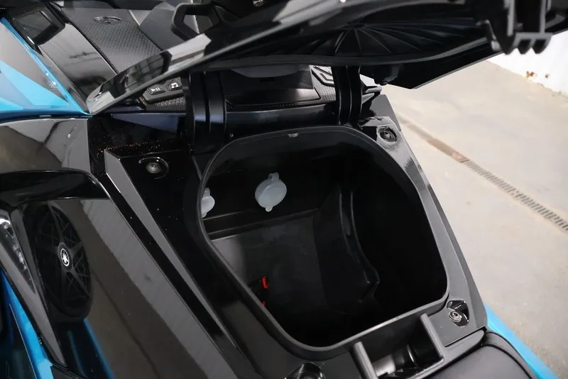 Slide: The Image of Open storage compartment of 2027 Yamaha WaveRunner VX Limited jet ski. - 12