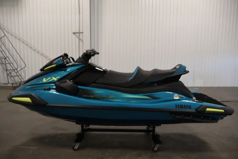 Slide: The Image of 2027 Yamaha WaveRunner VX Limited in blue, displayed indoors on a stand. - 9