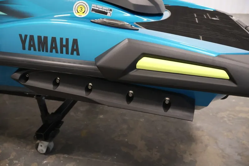 Slide: The Image of 2027 Yamaha WaveRunner VX Limited, blue and black design, close-up view. - 13