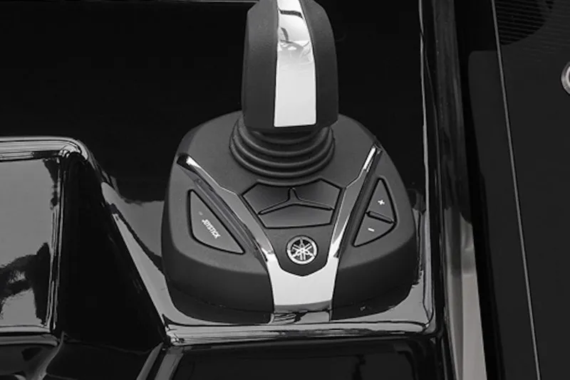 Slide: The Image of Close-up of 2027 Yamaha Boats 255XD joystick control system. - 6