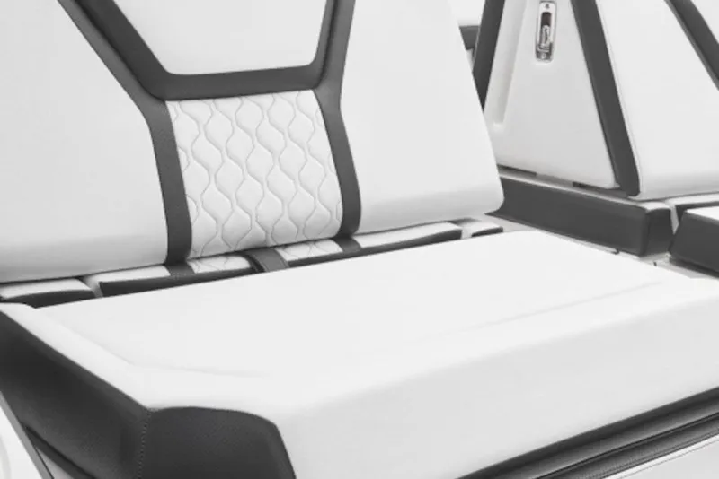 Slide: The Image of 2027 Yamaha Boats 255XD interior seating with modern design and quilted upholstery. - 11
