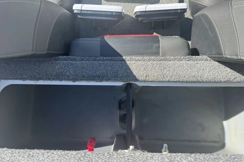 Slide: The Image of 2022 Tracker Pro Team 190 TX boat interior storage compartment. - 18