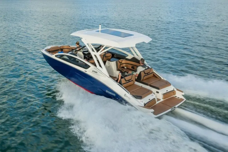 Slide: The Image of 2027 Yamaha Boats 275SD cruising on open water, showcasing sleek design and performance. - 4