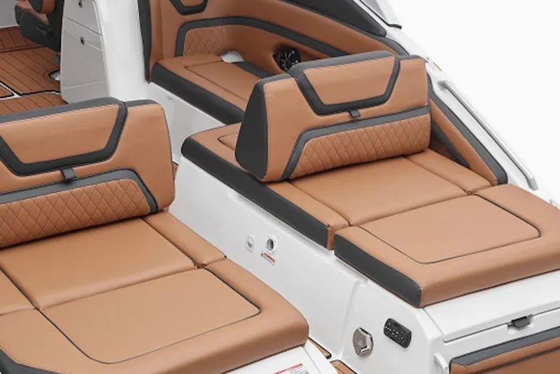 Slide: The Image of Luxurious seating on 2027 Yamaha Boats 275SD, featuring tan and black upholstery. - 7