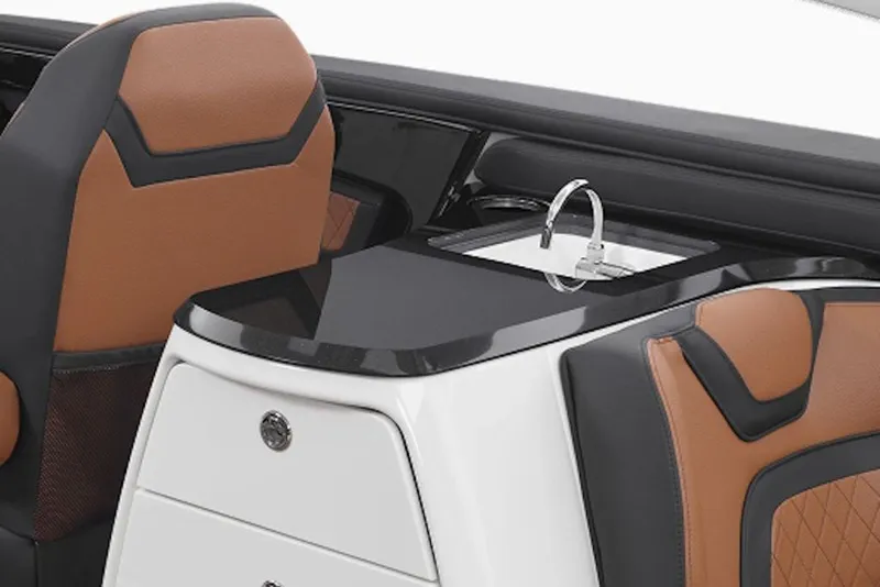 Slide: The Image of 2027 Yamaha Boats 275SD interior with sleek sink and luxurious seating. - 6