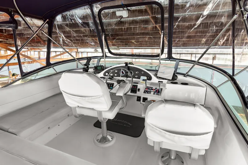 Slide: The Image of Interior cockpit of 2000 Bayliner 4087 Aft Cabin Motoryacht with steering controls. - 39