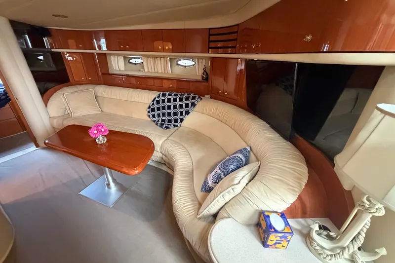 Slide: The Image of Luxurious interior of 1998 Sea Ray Sundancer 540 yacht with plush seating and elegant decor. - 15