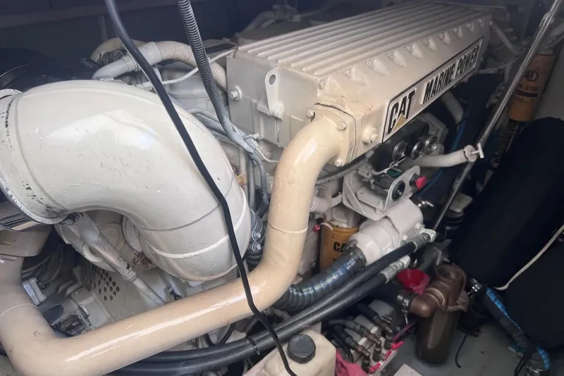 Slide: The Image of Engine of a 1998 Sea Ray Sundancer 540 with CAT Marine Power components. - 42