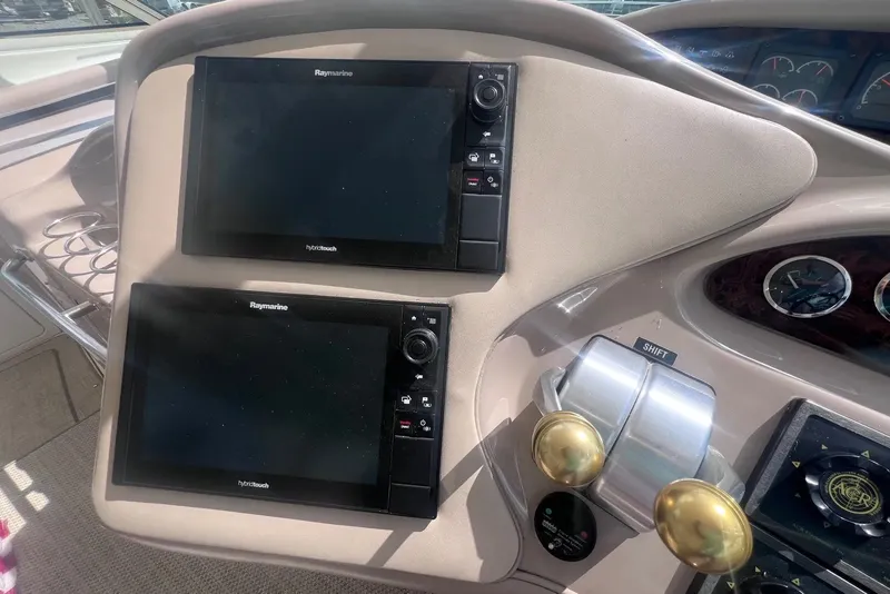 Slide: The Image of Control panel of a 1998 Sea Ray Sundancer 540 with Raymarine displays. - 40