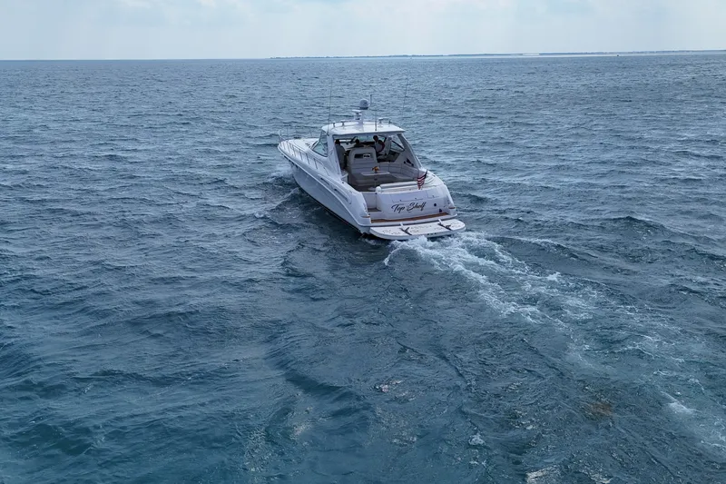 Slide: The Image of Sea Ray Sundancer 540 yacht cruising on open water, 1998 model. - 33