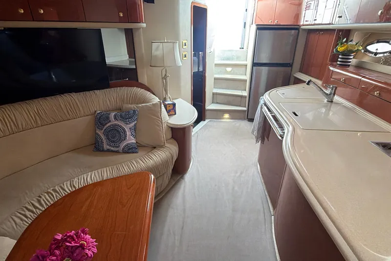 Slide: The Image of Luxurious interior of a 1998 Sea Ray Sundancer 540 yacht with elegant furnishings. - 16