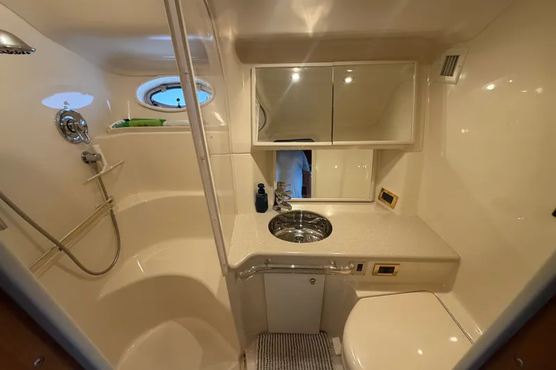 Slide: The Image of Luxurious bathroom in 1998 Sea Ray Sundancer 540 yacht with shower and vanity. - 19