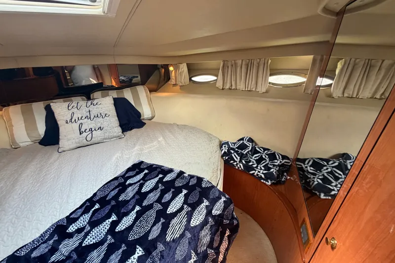 Slide: The Image of Cozy cabin interior of 1998 Sea Ray Sundancer 540 yacht with nautical decor. - 36