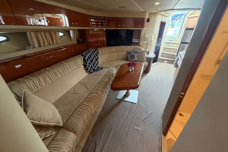 Slide: The Image of Luxurious interior of 1998 Sea Ray Sundancer 540 yacht with plush seating and elegant decor. - 20
