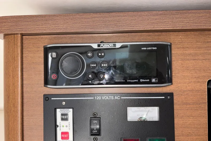 Slide: The Image of Fusion MS-UD750 stereo system on 2016 Sea Ray Sundancer 260 boat control panel. - 16