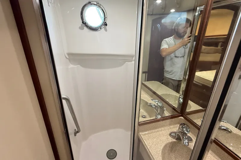 Slide: The Image of Bathroom interior of 2012 American Tug 365 with shower and sink. - 132