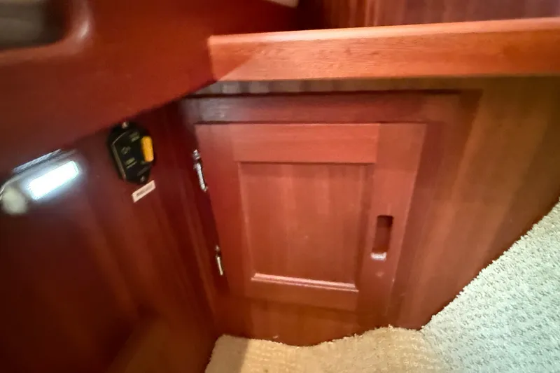 Slide: The Image of Wooden interior cabinet on a 2012 American Tug 365 boat. - 119