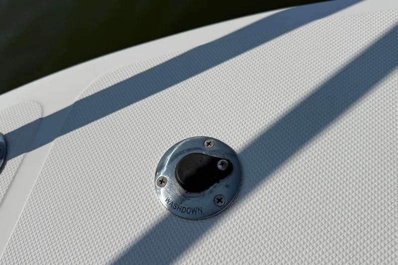 Slide: The Image of Close-up of a 2012 American Tug 365 washdown fitting on textured deck. - 9