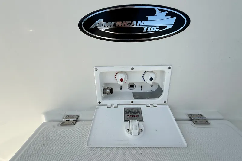 Slide: The Image of American Tug 365 boat water control panel with logo, 2012 model. - 33