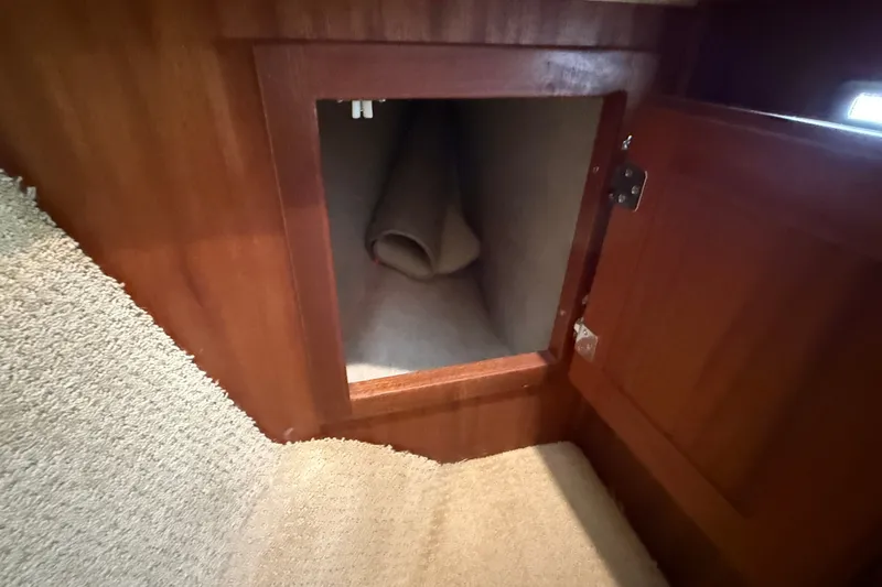 Slide: The Image of Interior storage compartment on a 2012 American Tug 365 boat. - 122