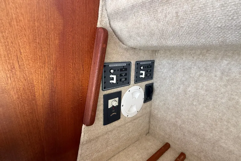Slide: The Image of Control panel and outlets on 2012 American Tug 365 boat interior. - 73
