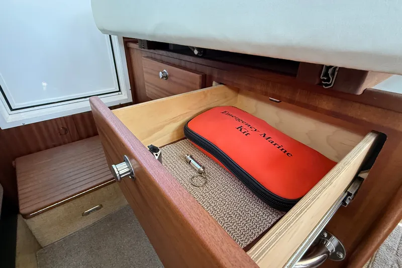 Slide: The Image of Drawer with emergency marine kit on 2012 American Tug 365 boat. - 98