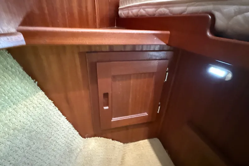 Slide: The Image of Wooden interior cabinet in 2012 American Tug 365 boat cabin. - 123