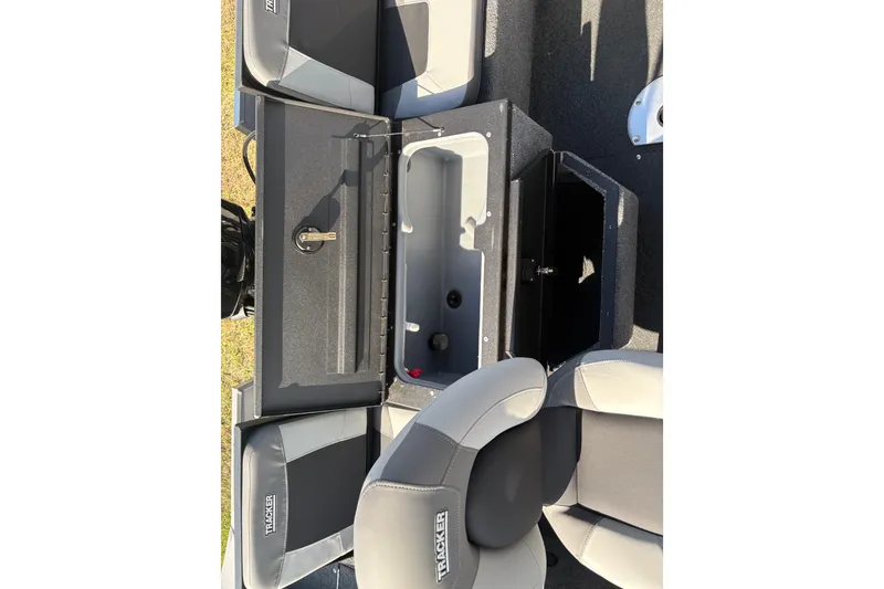Slide: The Image of 2027 Tracker Pro Guide V-175 Combo boat interior with storage compartments and seating. - 14