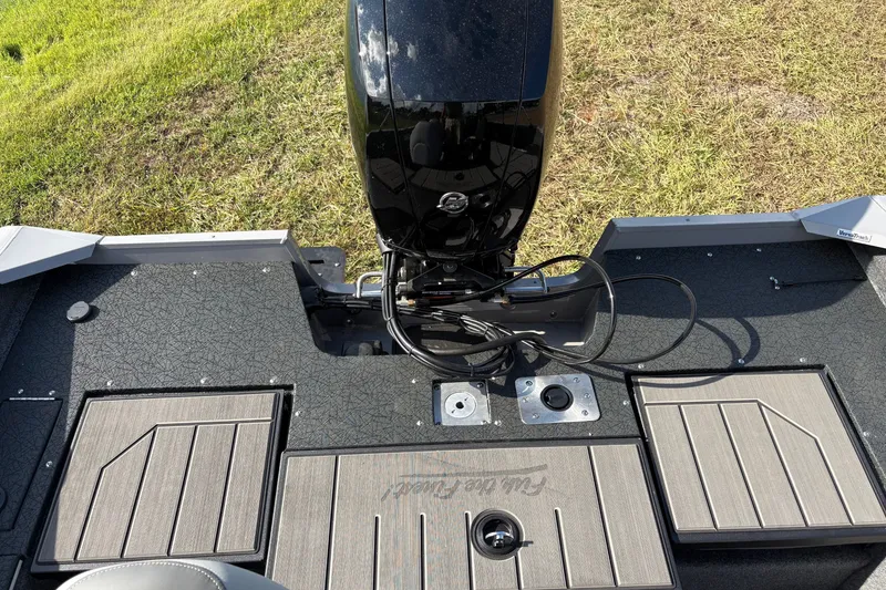 Slide: The Image of 2027 Tracker Pro Guide V-175 Combo boat deck with motor, featuring sleek design and durable materials. - 41