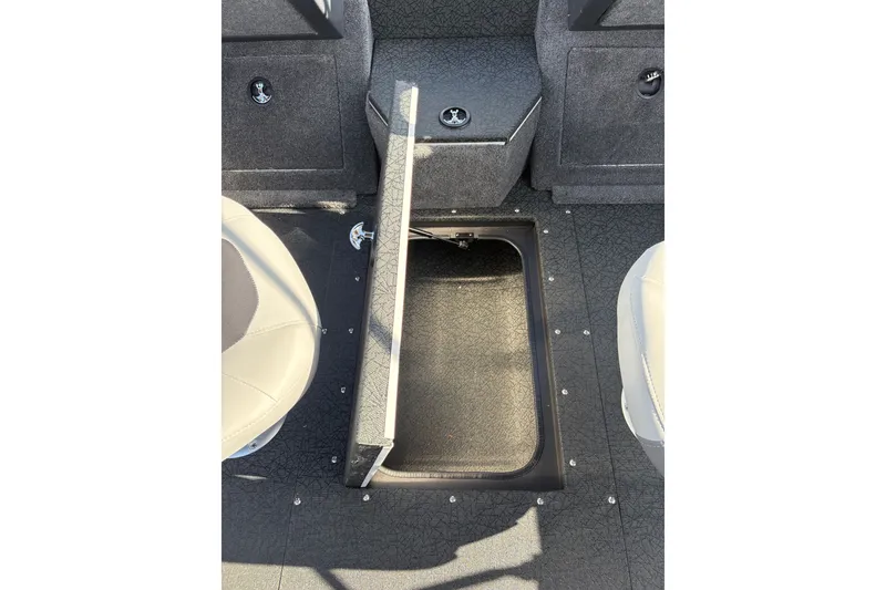Slide: The Image of 2027 Tracker Pro Guide V-175 Combo boat interior with open storage compartment. - 39