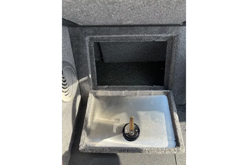 Slide: The Image of 2027 Tracker Pro Guide V-175 Combo boat storage compartment with secure latch. - 37