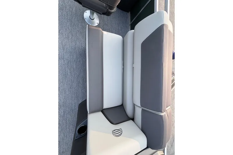 Slide: The Image of 2027 Sun Tracker Fishin' Barge 20 DLX boat seating, featuring gray and white upholstery. - 19